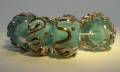 Encased Turquoise Bead with Lustre Glass Scrolls