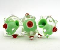 Encased Light Green with Red and White Dots