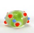 Encased Spring Green with Orange, Periwinkle, and White Dots