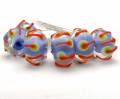 Encased Periwinkle Blue Handmade Lampwork Bead with Orange, Spring Green and White - Image 2